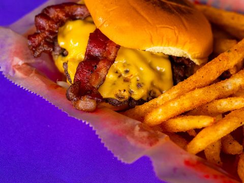 Bacon cheeseburger with fries at Bar South