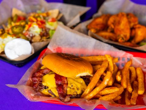Burger, fries, wings and nachos at Bar South