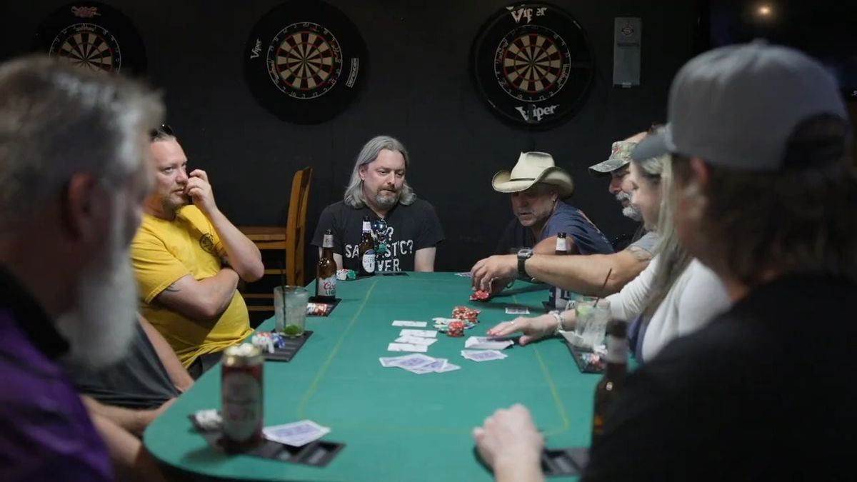 Players around the table on a free poker night at Bar South